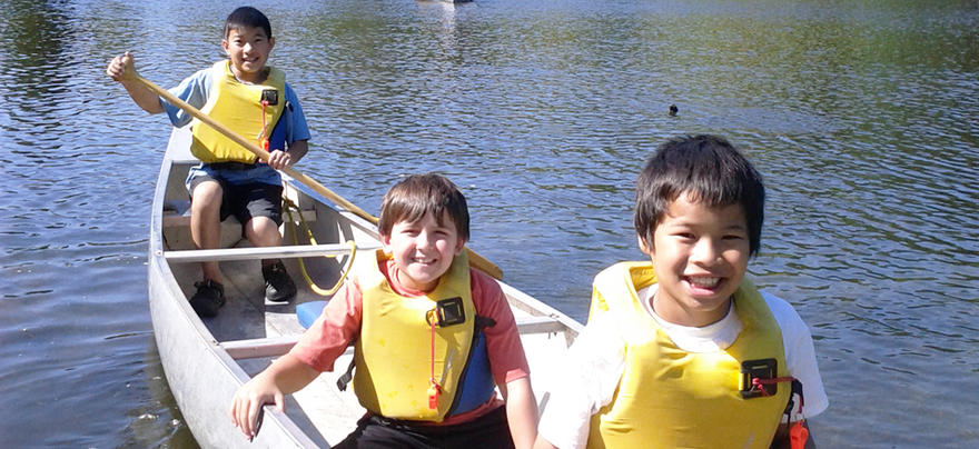 Kids in a canoe 