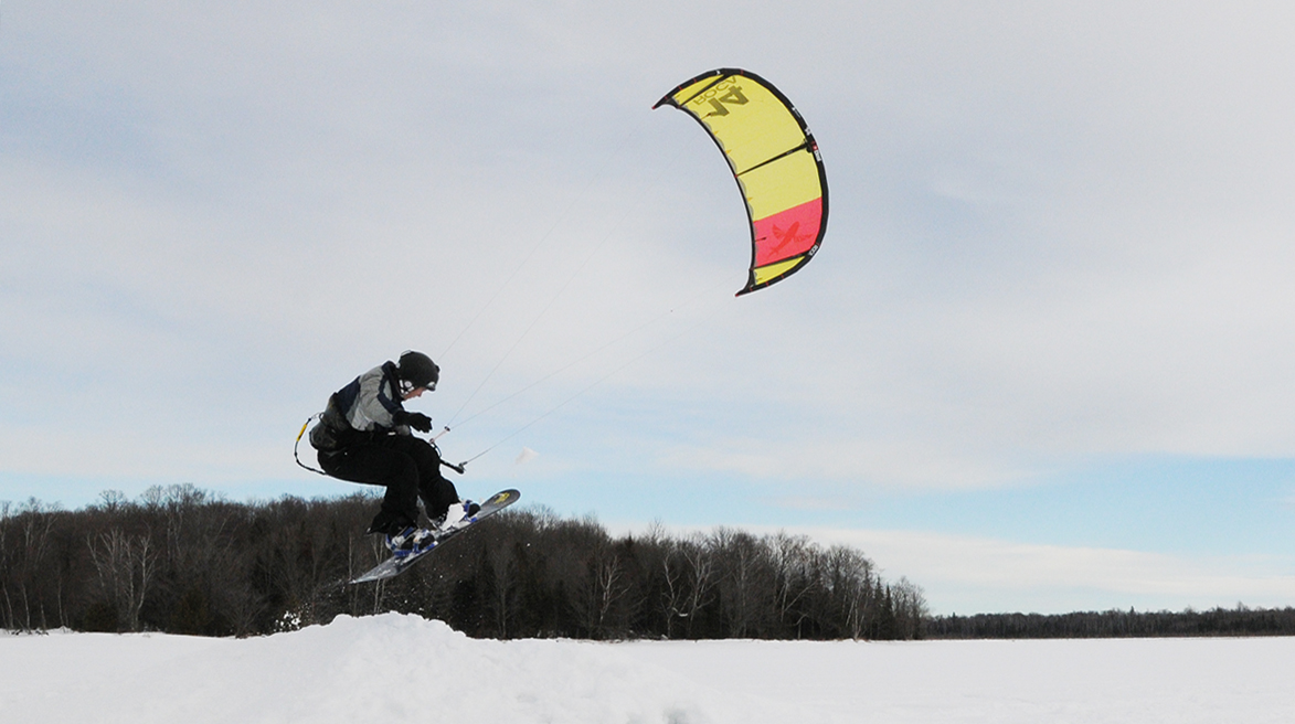 snow kiter jumping