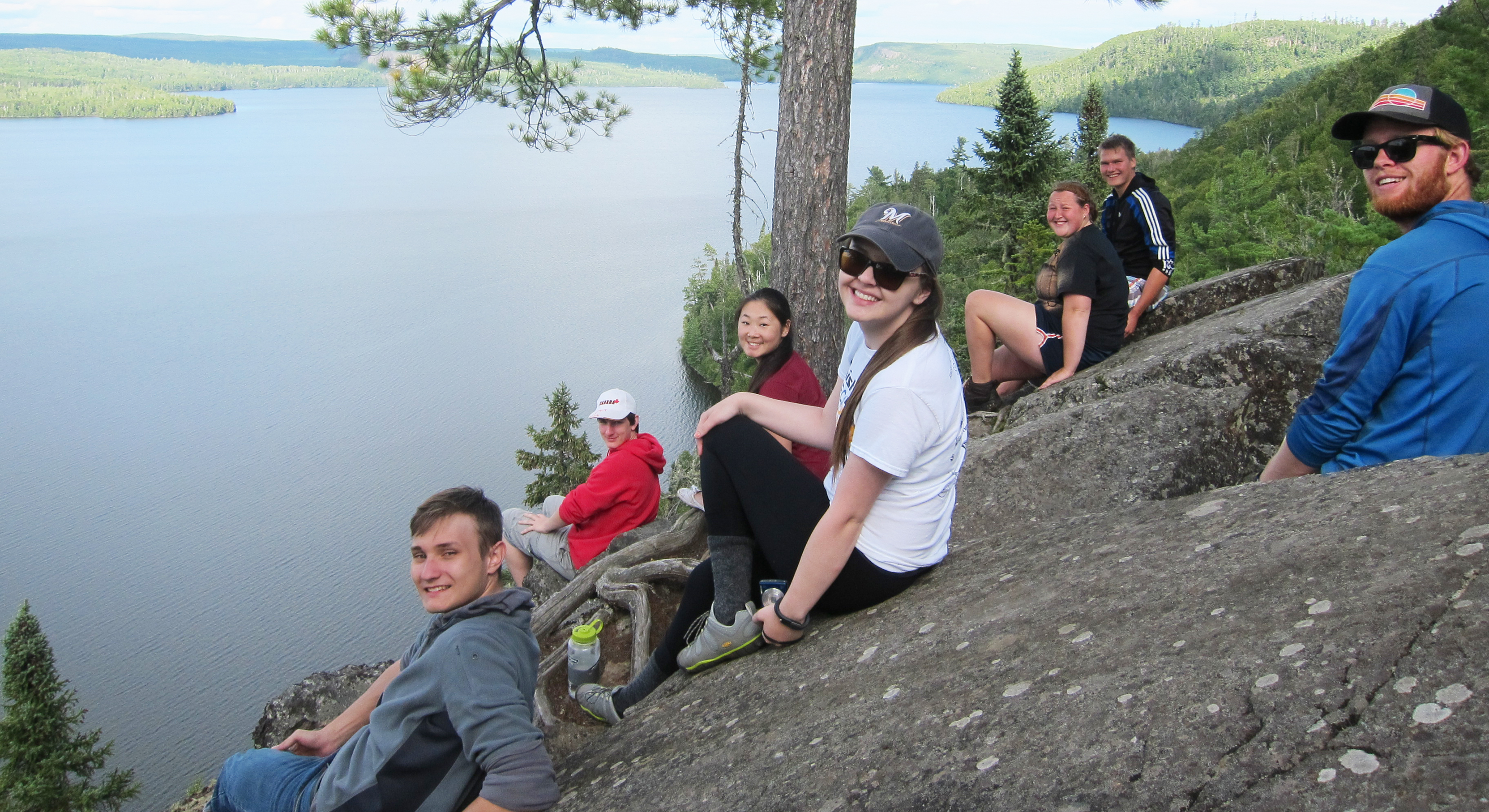 group of students overlooking a lake