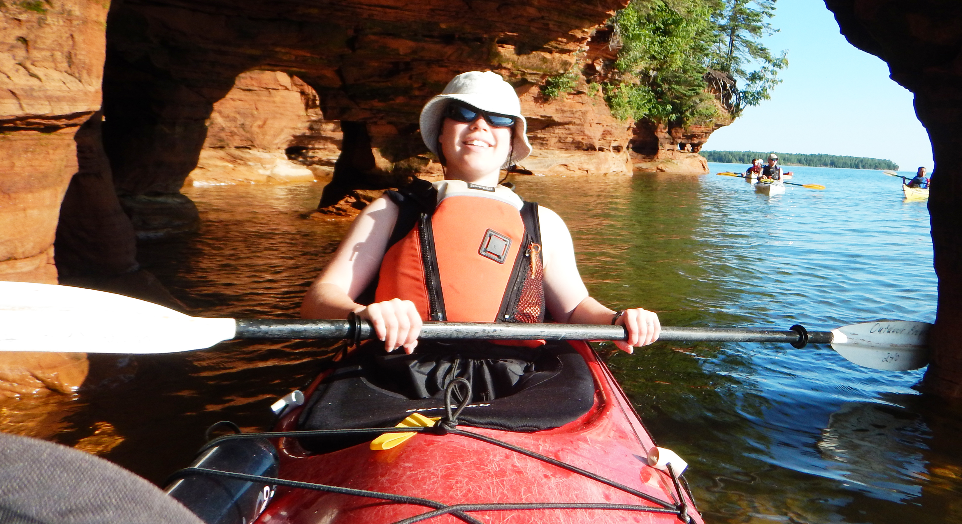 student sea kayaking in the Apostle Islands