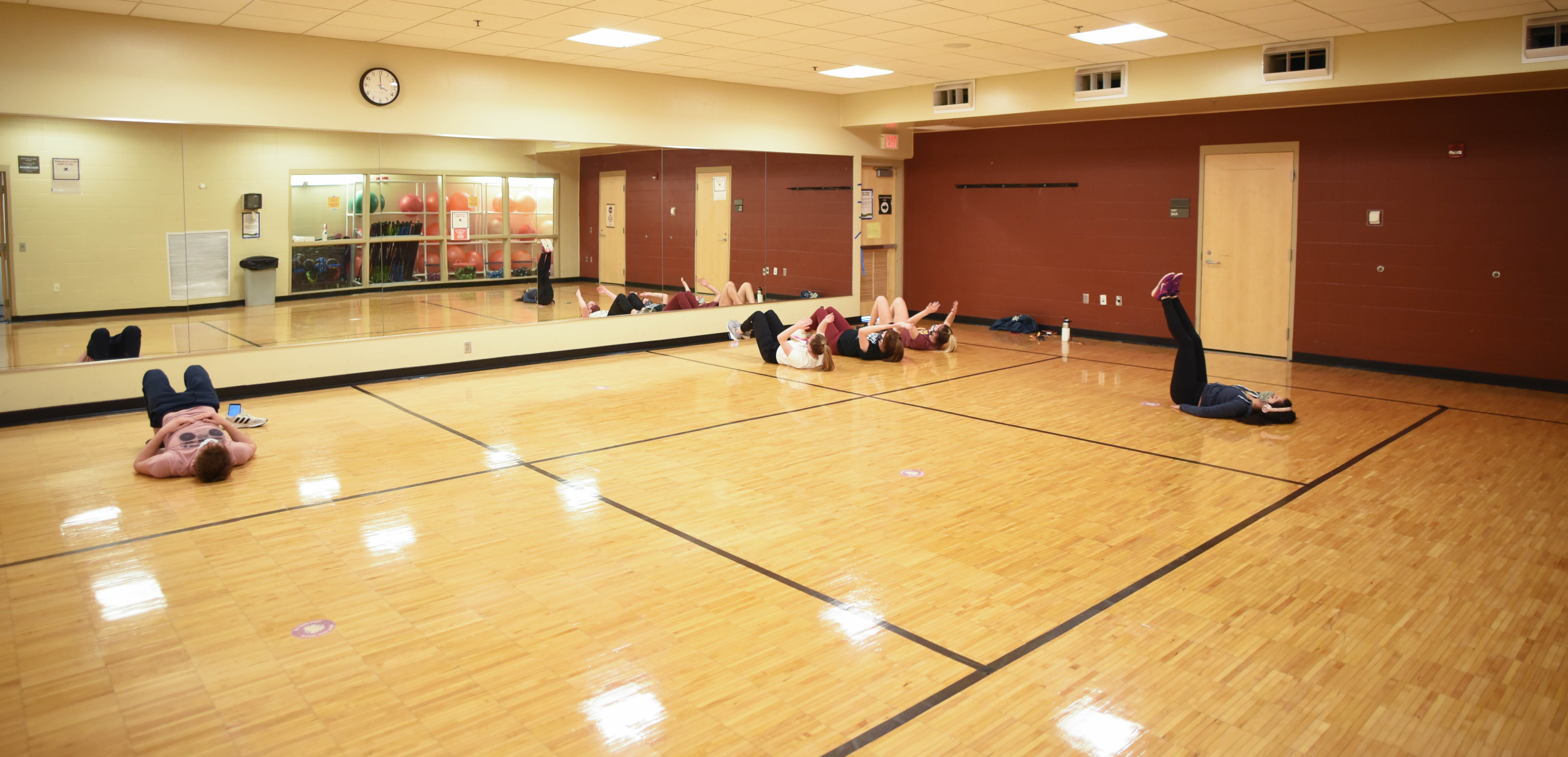 large room with people stretching