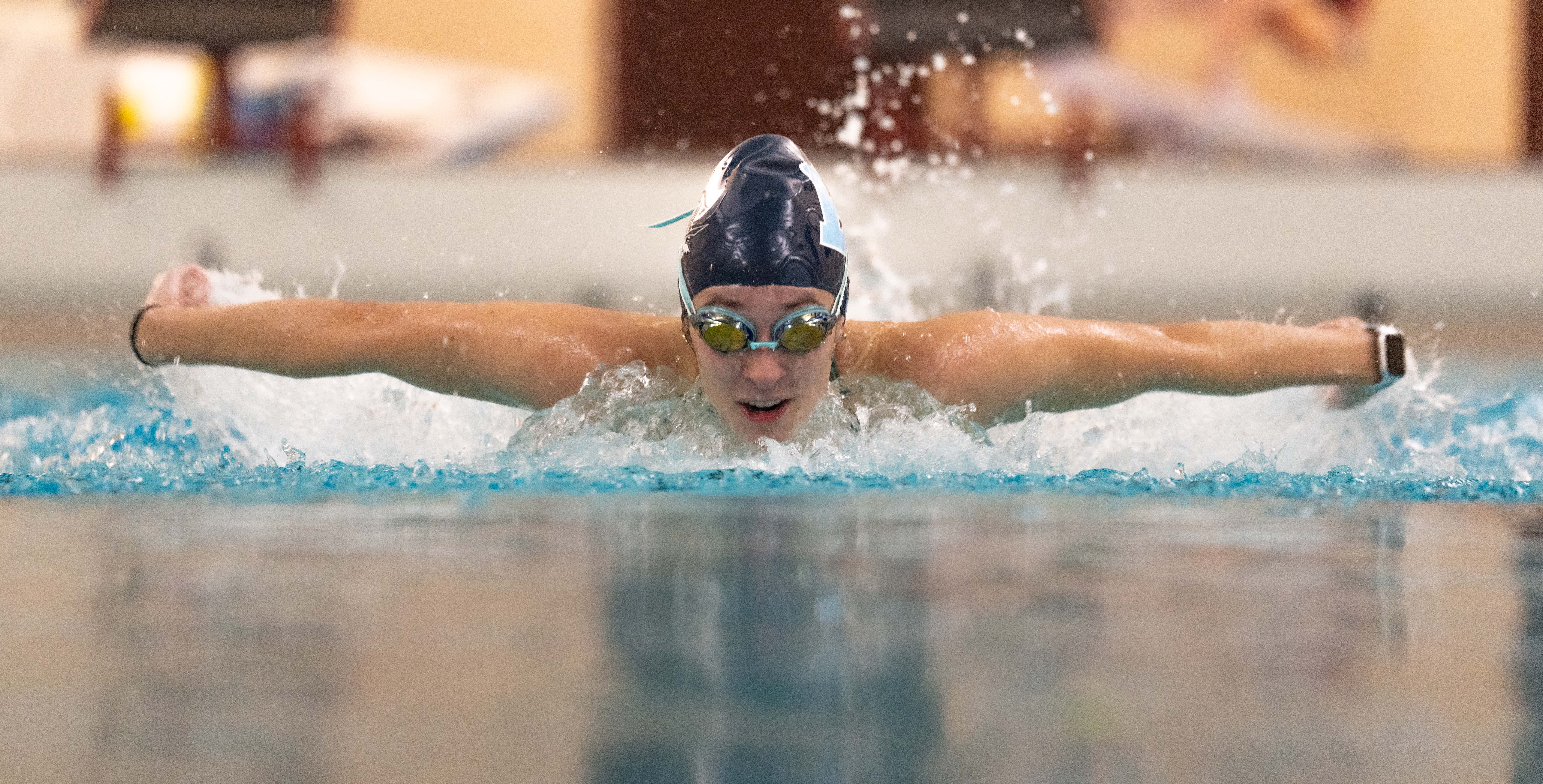 swimmer performing the butterfly stroke