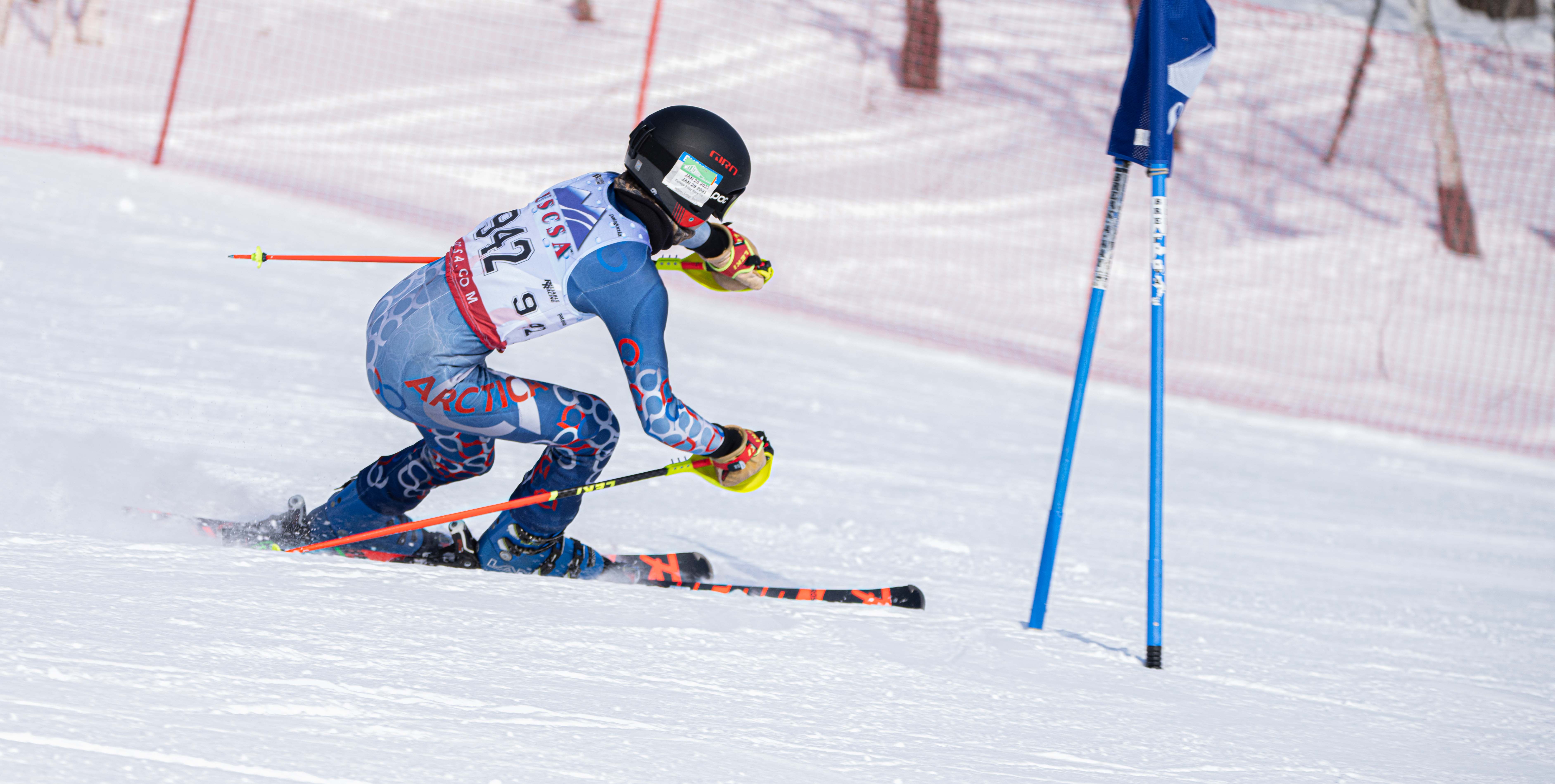 alpine skier approaching a gate