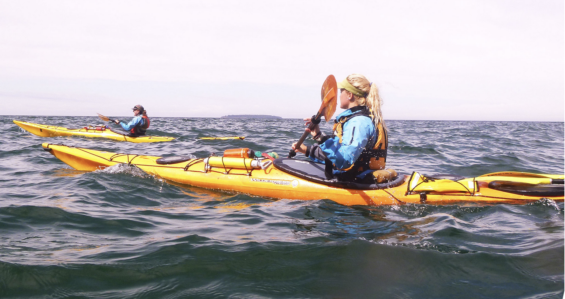 two people sea kayaking on Lake Superior