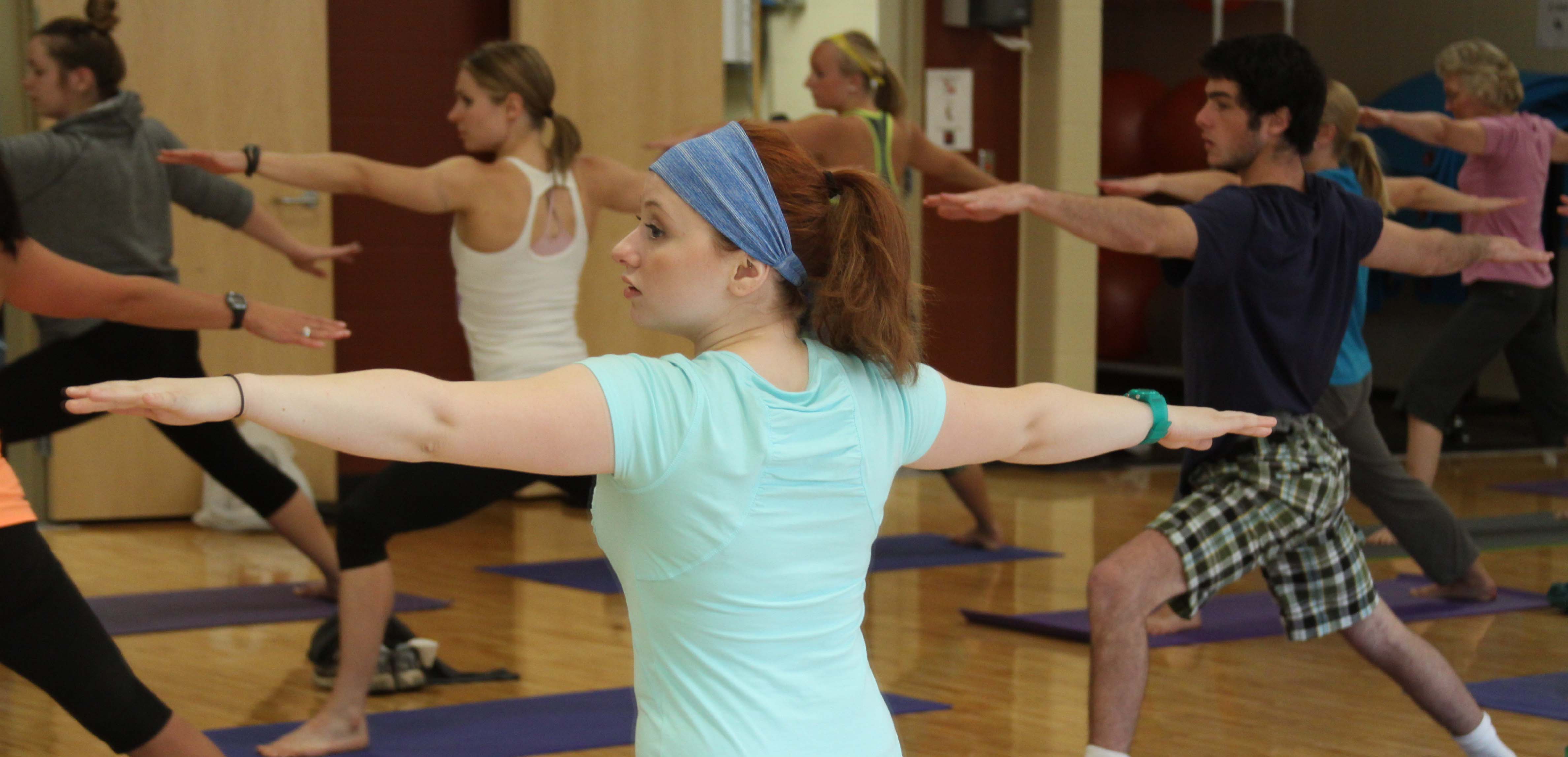 people participating in a yoga class